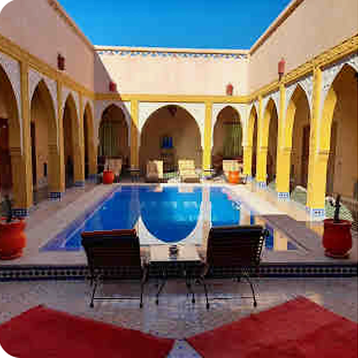 Curated riad courtyard with pool